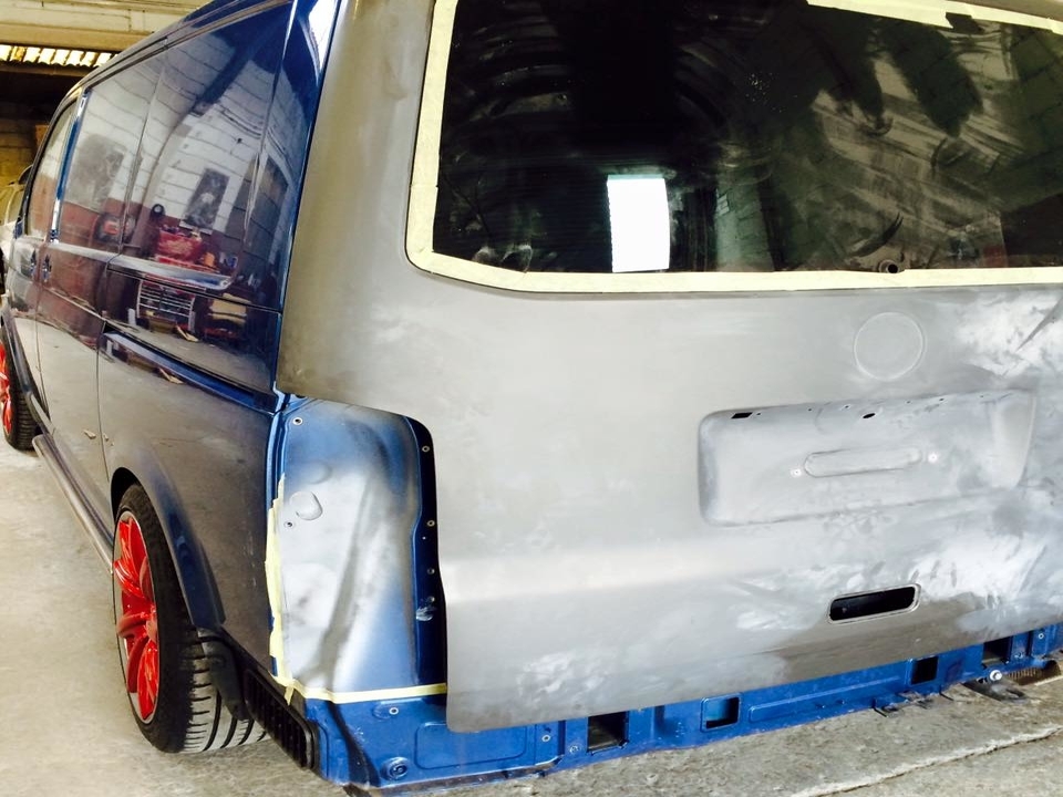 Primed Rear door ready for respray VW Transporter Van at AWL Swansea